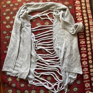 Gray sweater with distressed middle back